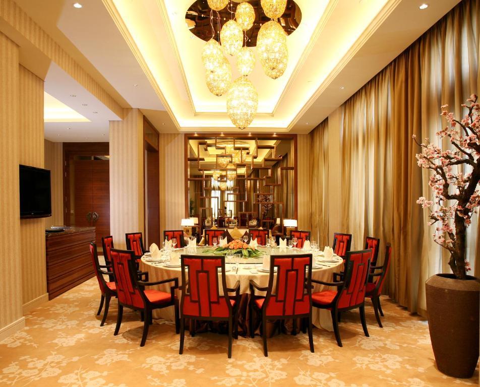 Landison Green Town Hotel Xinchang Buitenkant foto