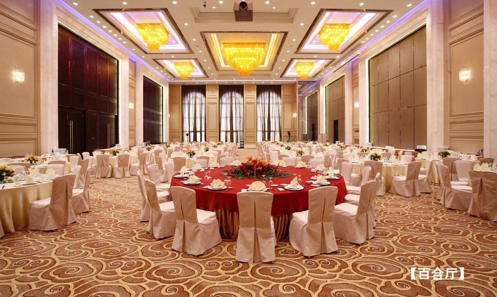 Landison Green Town Hotel Xinchang Buitenkant foto