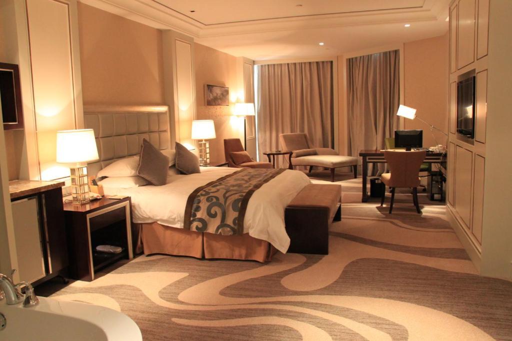 Landison Green Town Hotel Xinchang Kamer foto